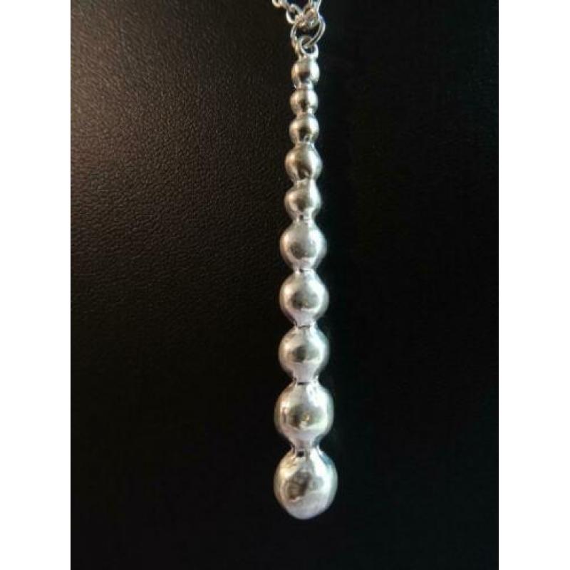Zilverkleurige ketting met lange strass hanger