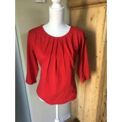 Zgan rood shirt, gekocht bij Stepping out. Is eigen merk.