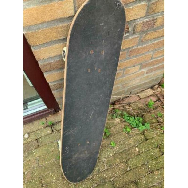 skateboard blauw met wit