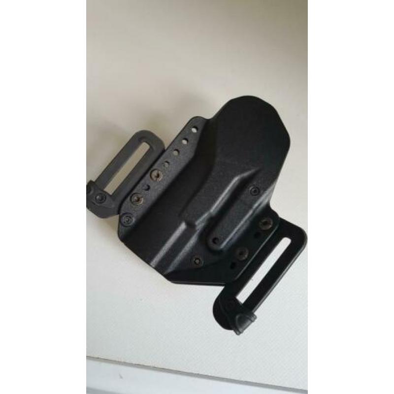 schouderholster en heupholster