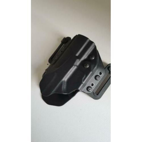 schouderholster en heupholster