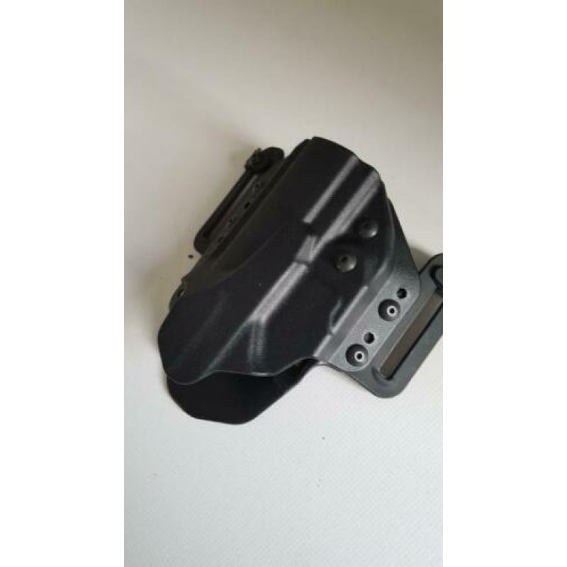schouderholster en heupholster