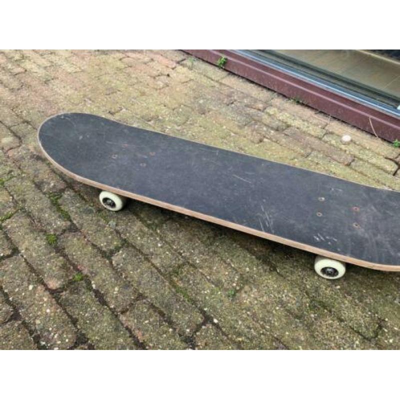 skateboard blauw met wit