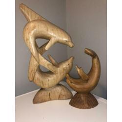 Houten dolfijnen beelden