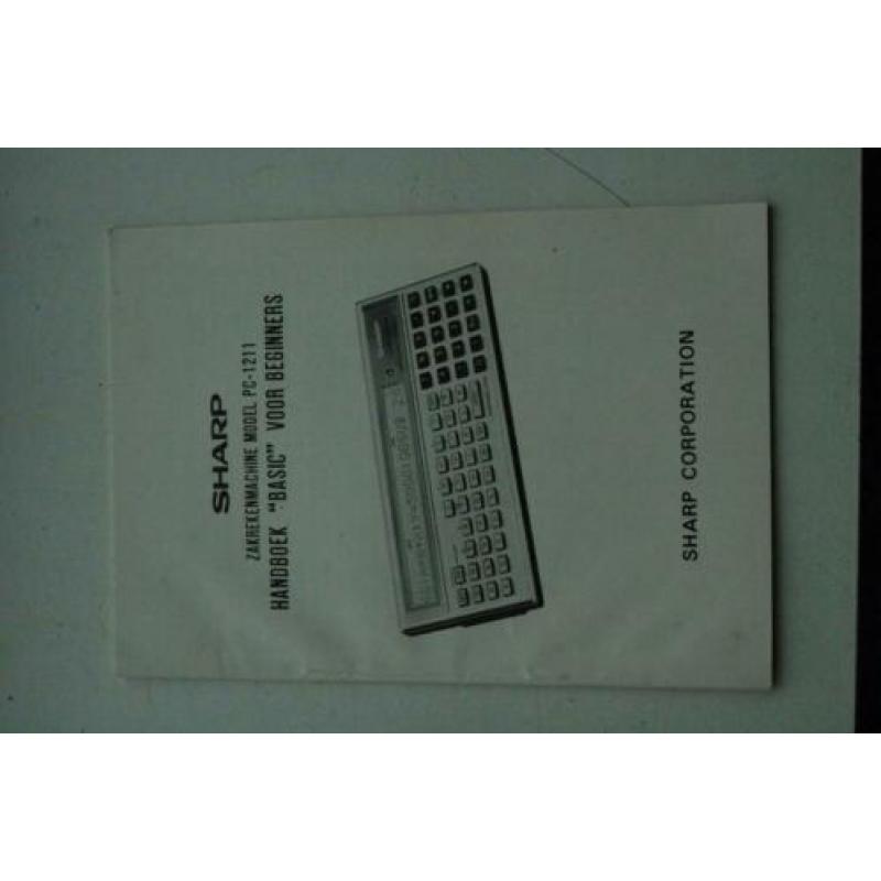 Sharp PC-1211 manual rekenmachine calculator
