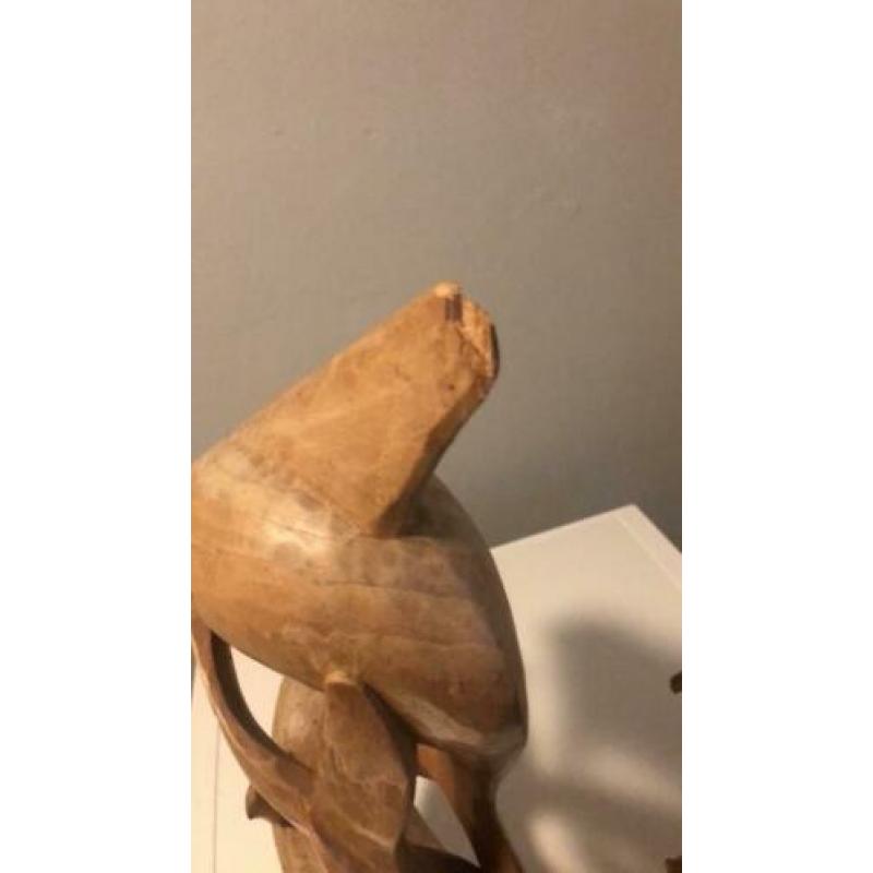 Houten dolfijnen beelden
