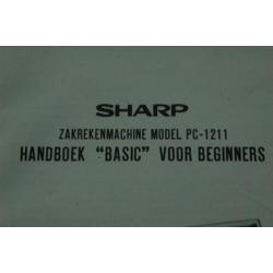 Sharp PC-1211 manual rekenmachine calculator