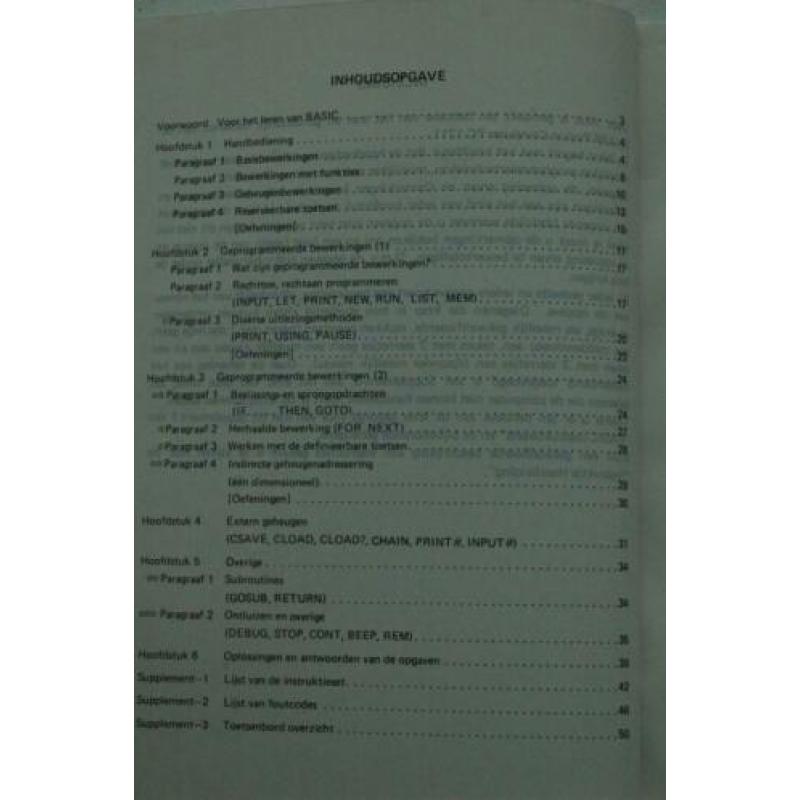 Sharp PC-1211 manual rekenmachine calculator