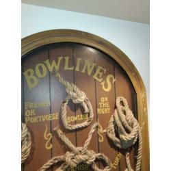 Houten wandbord met zeilboot en knopen