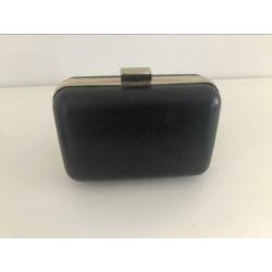 Black clutch bag with gold trim, 212 VIP by Carolina Herrera