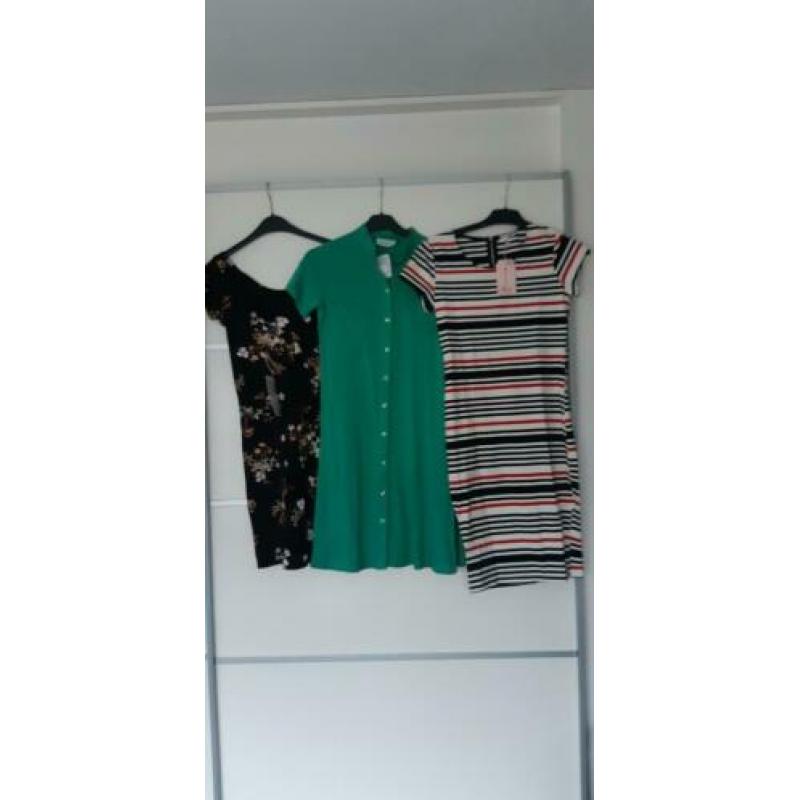 Pakket nieuwe kleding. Jurken en t shirts S/36