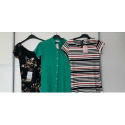 Pakket nieuwe kleding. Jurken en t shirts S/36
