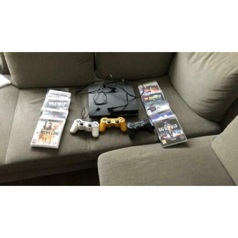 PS3 plus 3 controllers en spellen