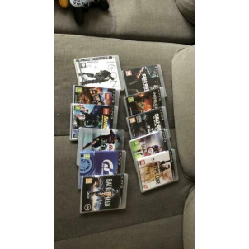 PS3 plus 3 controllers en spellen