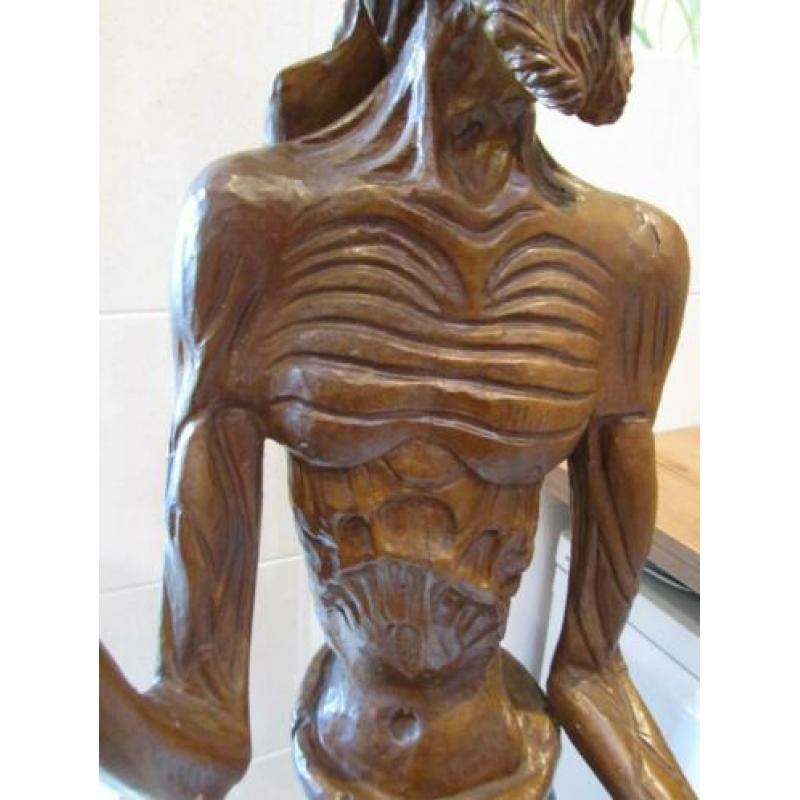 Houten beeld houtsnijwerk man java bali indonesië