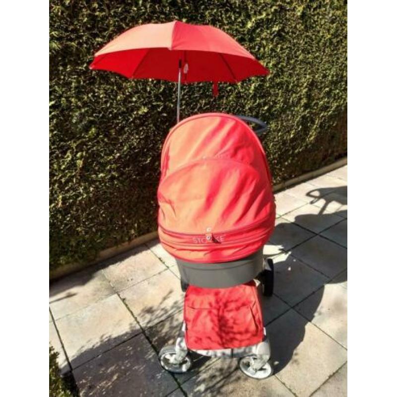 Rode Stokke kinderwagen