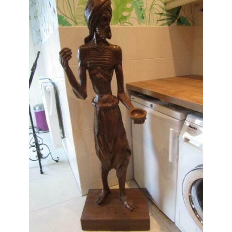 Houten beeld houtsnijwerk man java bali indonesië