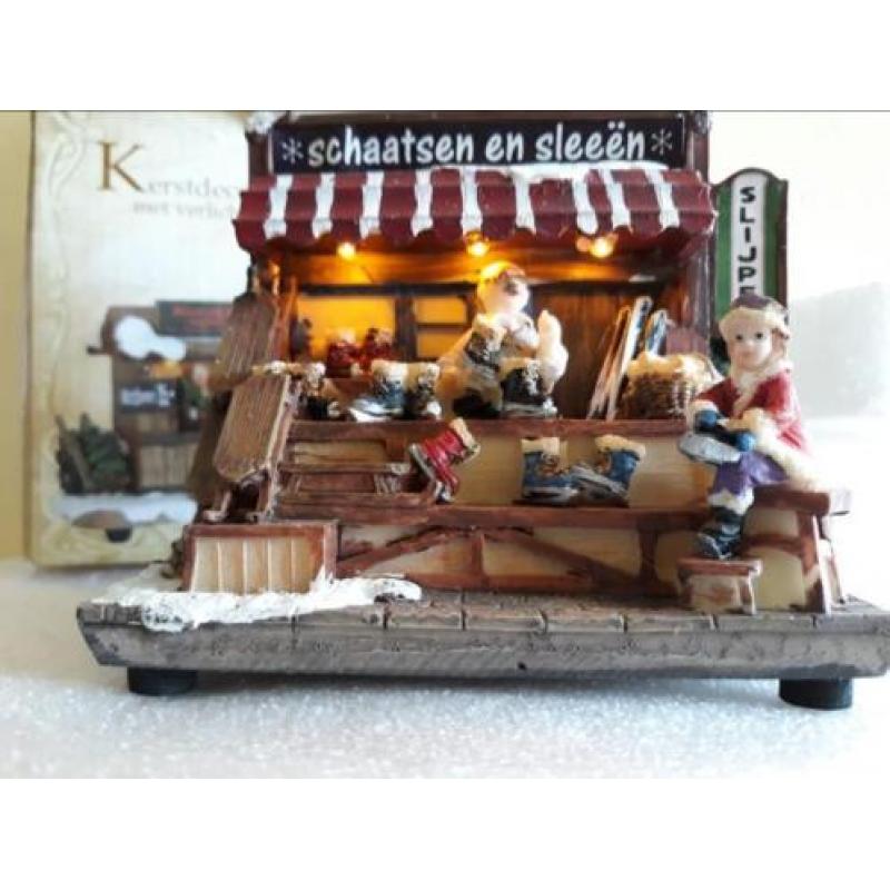 Schaatsen en sleeën en Kerstbomen van Piet (geen Lemax)